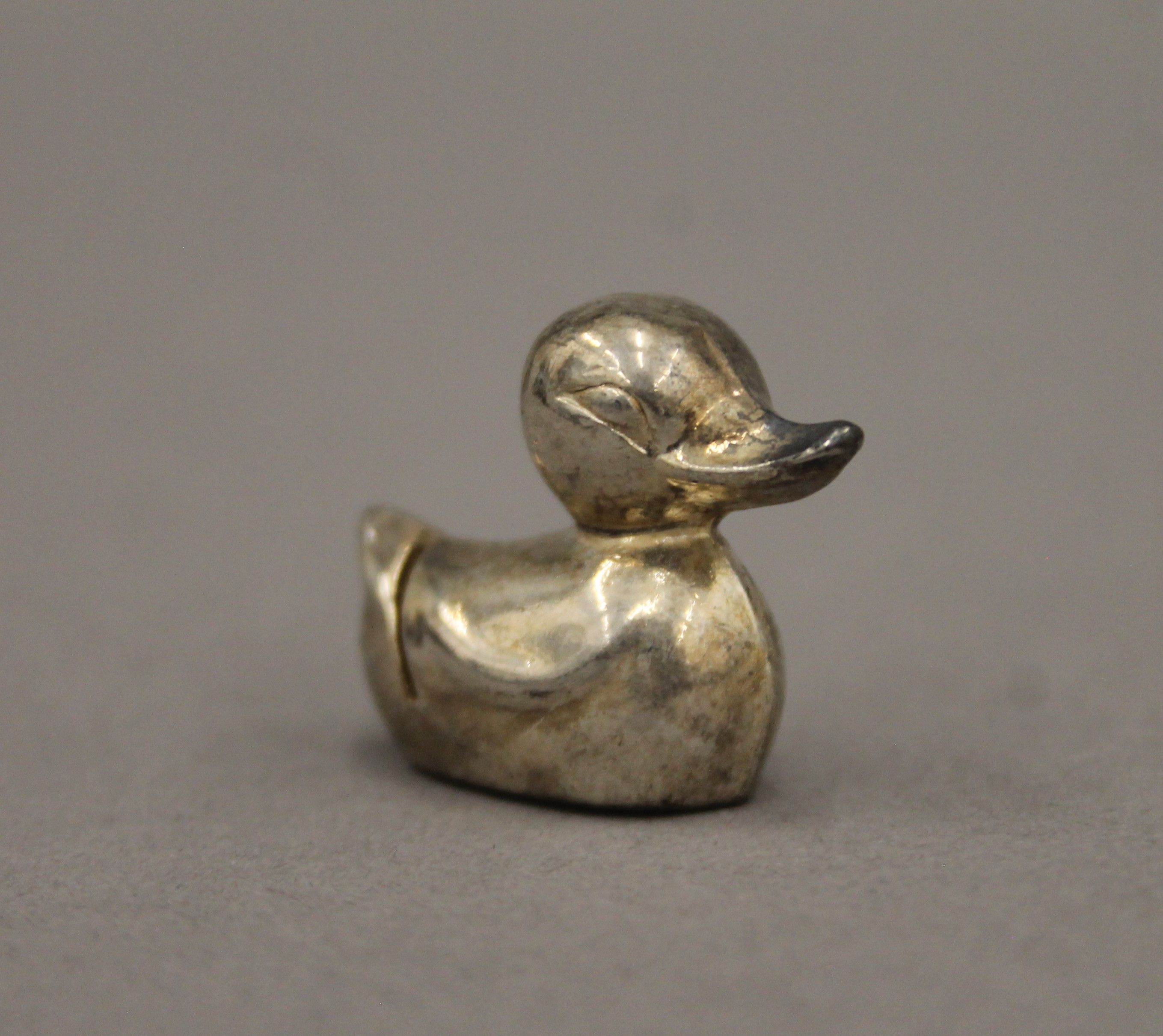 A set of six plated duck form menu holders and three silver napkin rings. 56. - Image 3 of 8