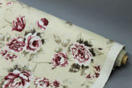 A roll of floral fabric.