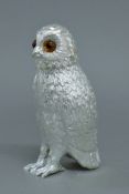 A silver plated owl sugar sifter. 15 cm high.