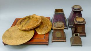 A quantity of various wooden plinths, a Chinese low stand, a stool, etc. The stool 37 cm long.