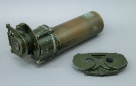 A boxed Naval gun sight. The box 39 cm long.