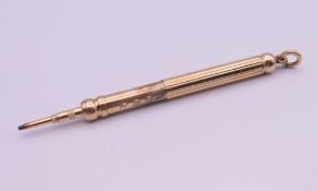 An unmarked 9 ct gold (tested) Samson Morden & Co propelling pencil. 9.5 cm long extended.
