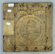 An antique carved oak panel. 35.5 x 35.5 cm.