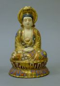 A Satsuma model of Buddha. 19.5 cm high.