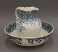 A Victorian porcelain wash jug and bowl.