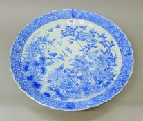 A Chinese Swatow Ware blue and white porcelain charger. 47 cm diameter.