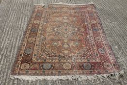 A Tabriz wool rug. 140 x 190 cm.