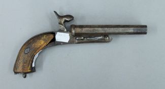 A 19th century pinfire double barrelled pistol. 25 cm long.