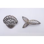 Two marcasite brooches. The largest 4 cm wide.