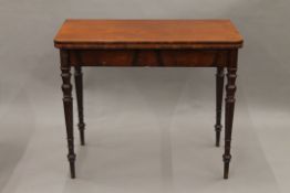 A 19th century mahogany folding tea table. 89 cm wide.