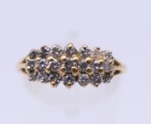 An 18 ct gold ring set with 0.5 carat of diamonds. Ring size P. 2.8 grammes total weight.