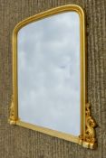 A gilt framed overmantle mirror. 135 cm wide.