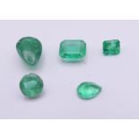 Five loose emeralds. The largest 8 mm long.