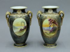 A pair of Japanese painted porcelain vases. 26.5 cm high.