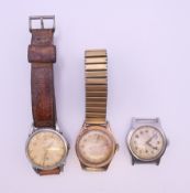 A vintage gentlemen's Incabloc wristwatch and two others. The former 3 cm wide.