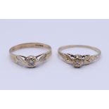 Two 9 ct gold diamond solitaire rings. Each ring size O/P. 2.6 grammes total weight.
