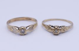 Two 9 ct gold diamond solitaire rings. Each ring size O/P. 2.6 grammes total weight.