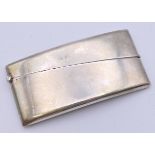 A George V silver rectangle curved card case, Birmingham 1923. 4 cm wide. 36.3 grammes total weight.