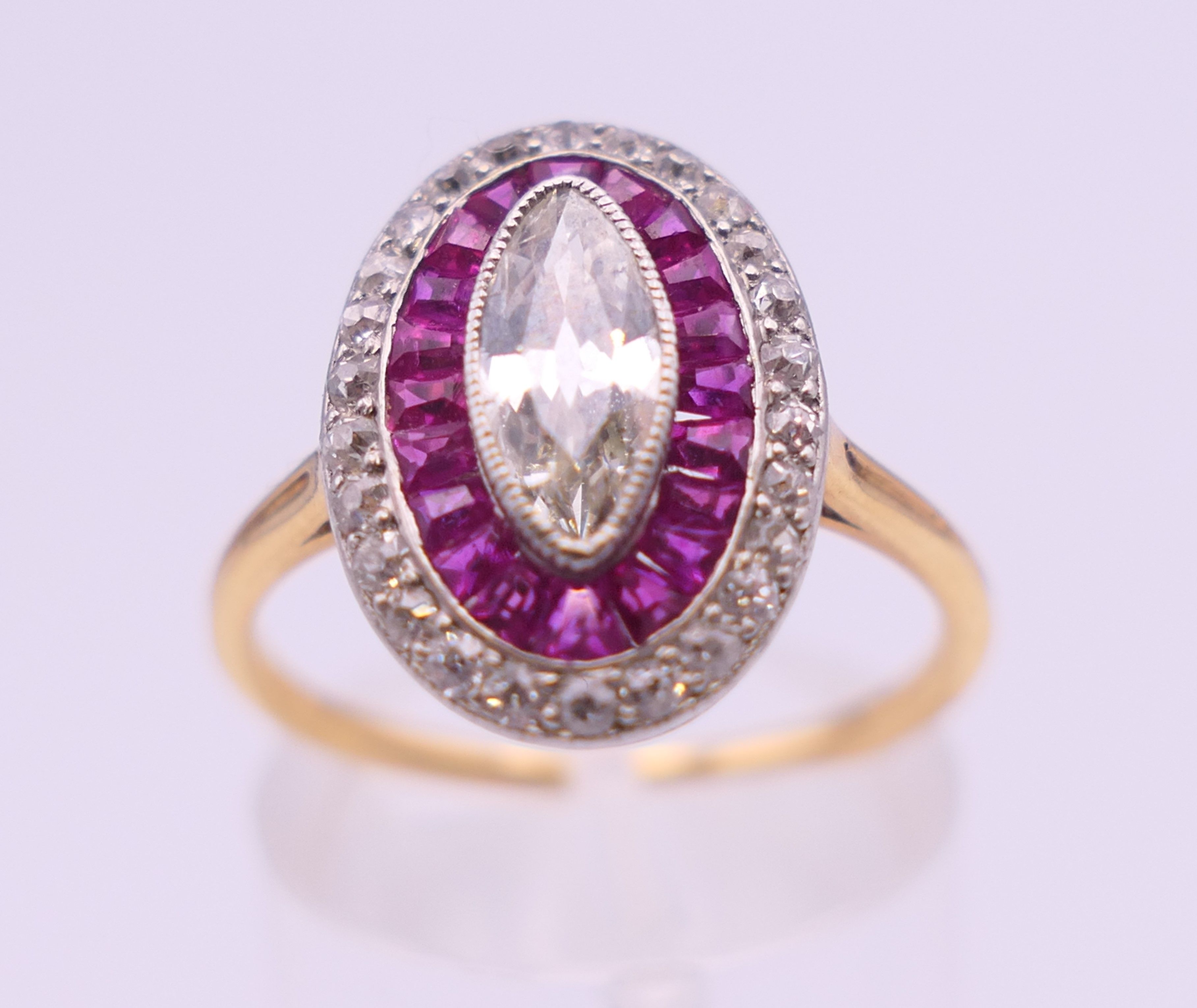 An unmarked 18 ct gold diamond and ruby ring, the central stone 9 mm high. Ring size O. 4. - Image 2 of 6