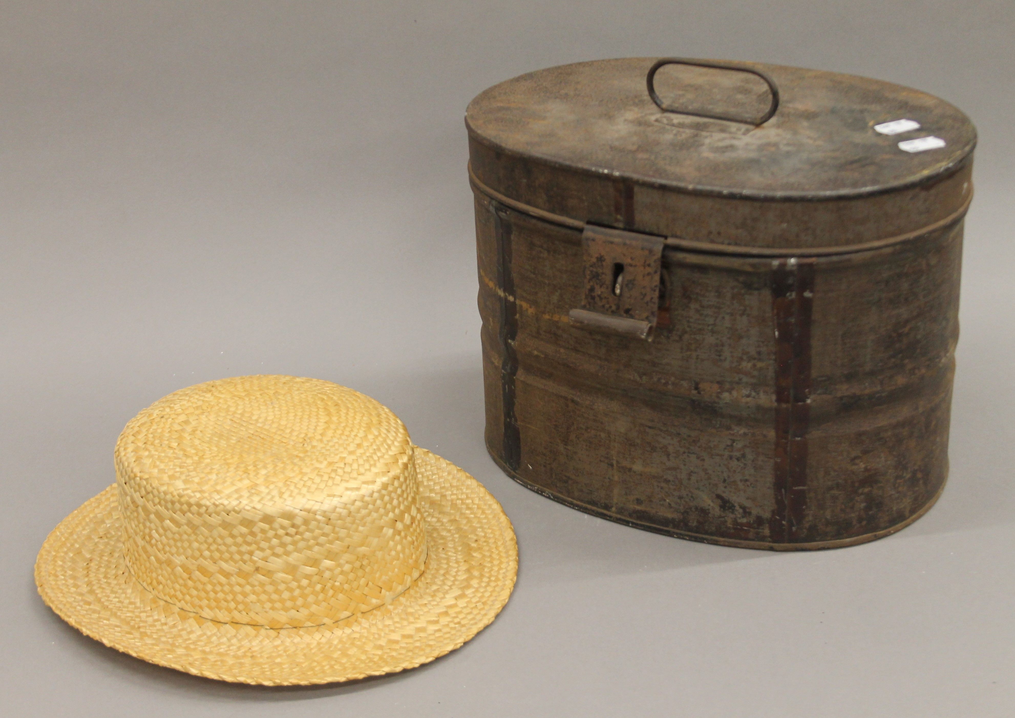 A Victorian hat tin. 24.5 cm high.