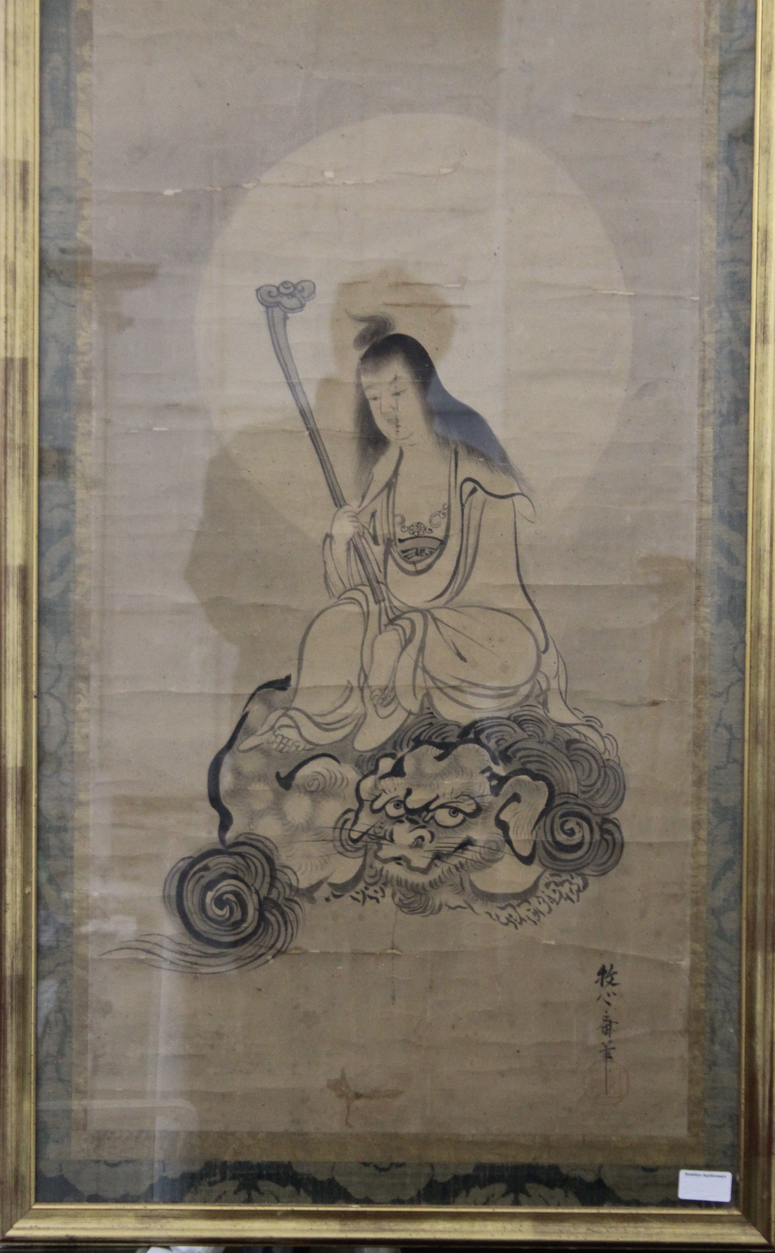 A Chinese scroll painting, decorated with Guanyin holding a ruyi sceptre seated on a dragon, - Image 2 of 3