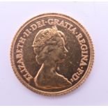 A 1982 gold half sovereign.