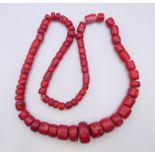 A bead necklace 94 cm long.