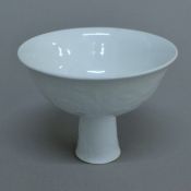A Chinese white porcelain stem cup. 14.5 cm diameter.