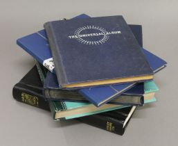A pre-decimal stock book, a Worlds stamp album, a UK stamp album and First Day covers.