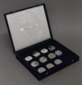 A silver proof coin set commemorating Queen Elizabeth II 80th Birthday, in box with certificates.
