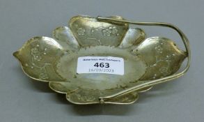 A small Chinese silver basket. 14 cm long. 91.3 grammes.