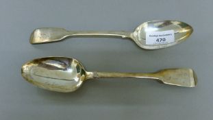 A pair of Georgian silver table spoons. 22 cm long. 149.2 grammes.