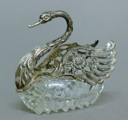 A 925 silver and cut glass swan form bon-bon dish. 10 cm high.