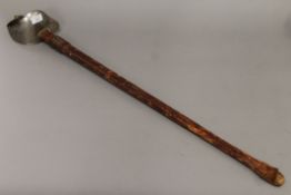 A George V Service sword in leather scabbard. 101 cm long.