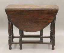An early 20th century oak gate-leg table. 90 cm long.