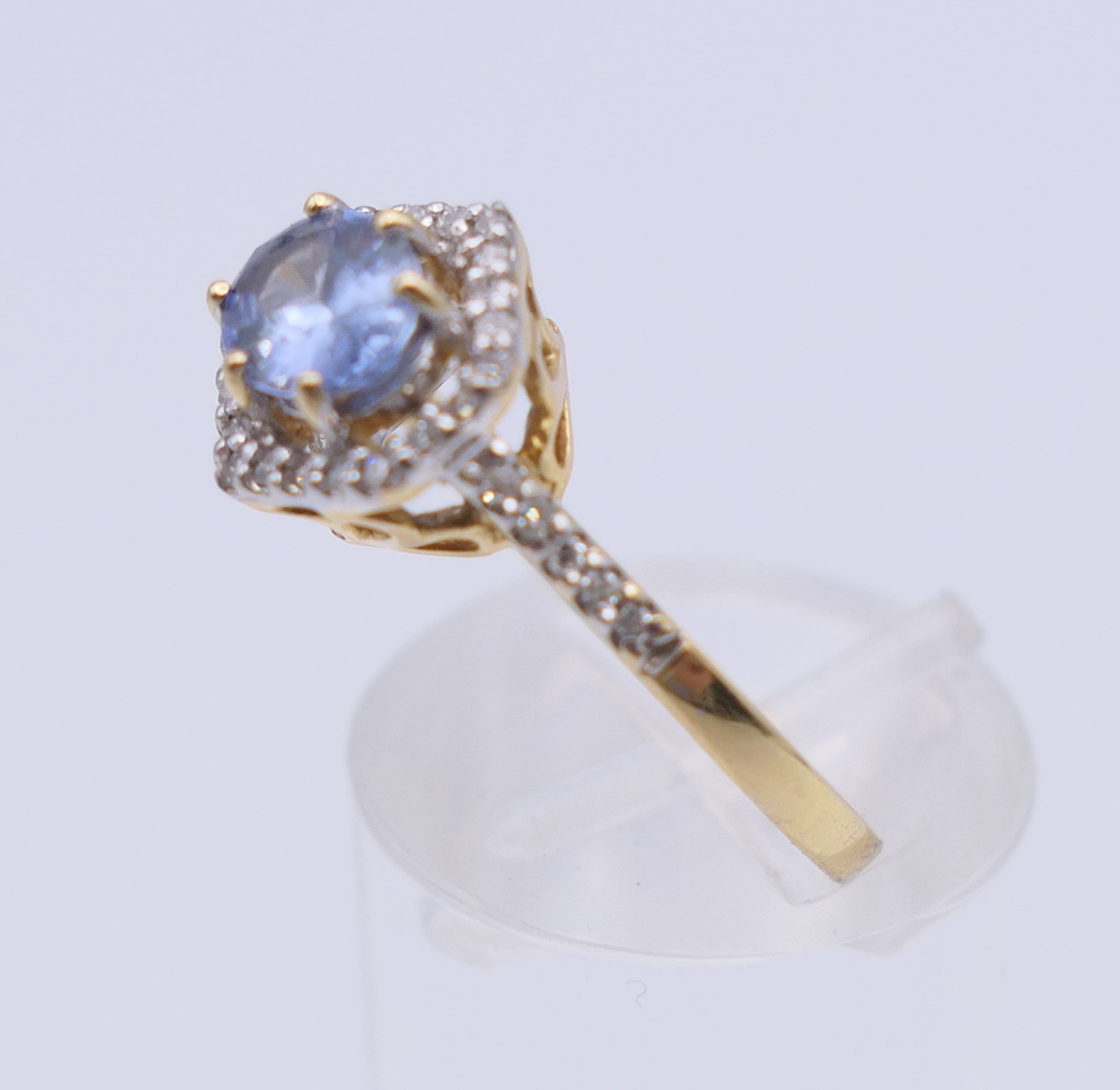 An 18 ct gold Ceylon sapphire and diamond ring. 10 mm x 10 mm. Ring size L/M. 3. - Image 5 of 9
