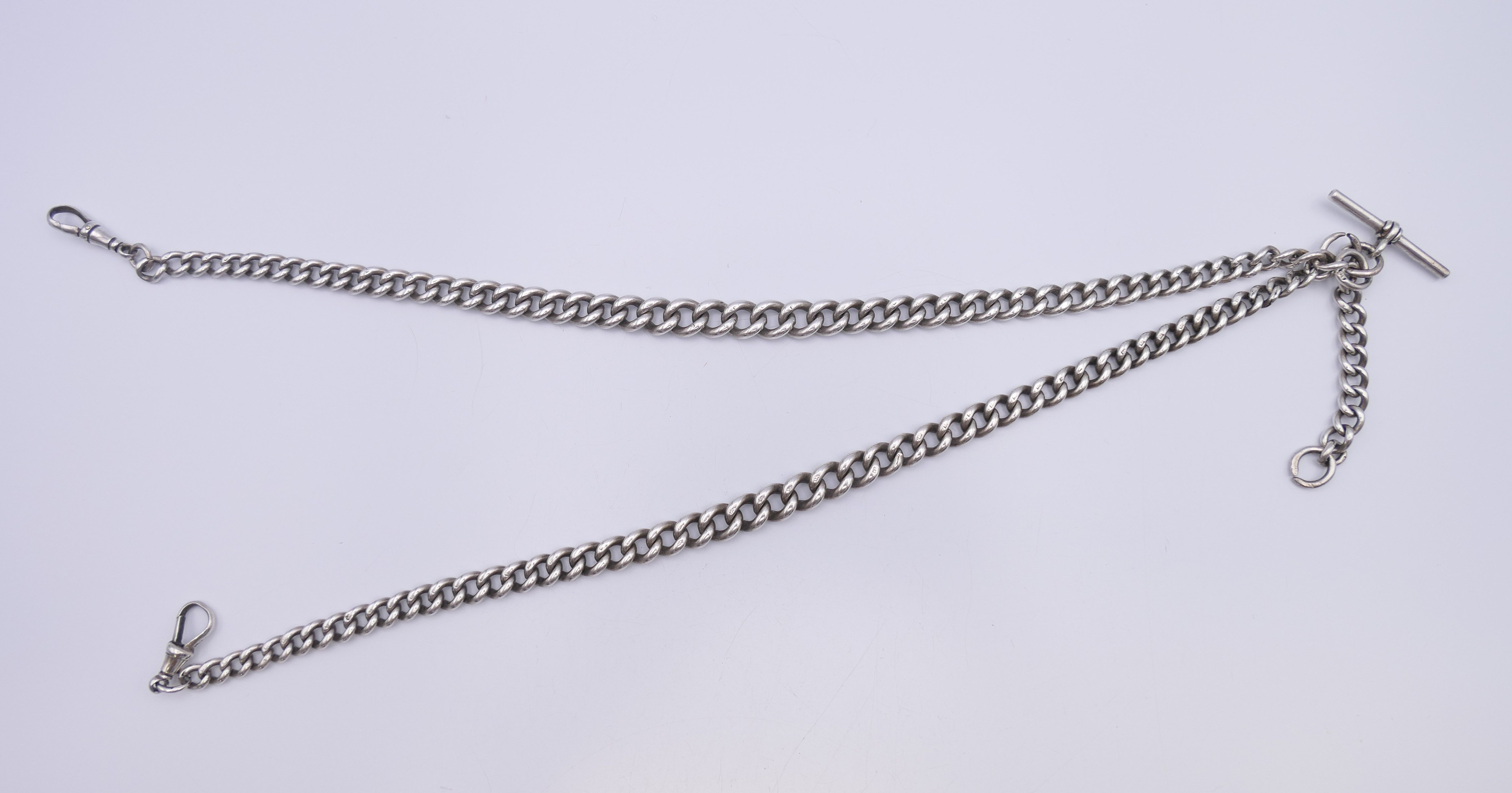 A silver watch chain. 67 cm long. 98.4 grammes. - Image 4 of 7