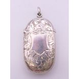 A Victorian silver vesta case with leaf/shield chased pattern, Birmingham 1898,