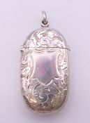 A Victorian silver vesta case with leaf/shield chased pattern, Birmingham 1898,