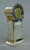 An Art Nouveau silver mantle clock. 15.5 cm high.
