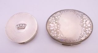 Two silver compacts. The largest 7 cm long. 99 grammes total weight.
