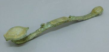 A Chinese jade and bronze ruyi sceptre. 29.5 cm long.