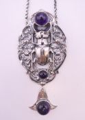 A silver amethyst beetle necklace and pendant, the pendant 9.5 cm high.