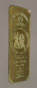A brass plaque inscribed for Colts Armory. 9.5 x 25.5 cm.