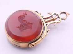 An unmarked 9 ct gold carnelian and bloodstone swing fob. 4.5 cm high.