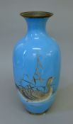 A large cloisonne vase decorated with geese. 40 cm high.