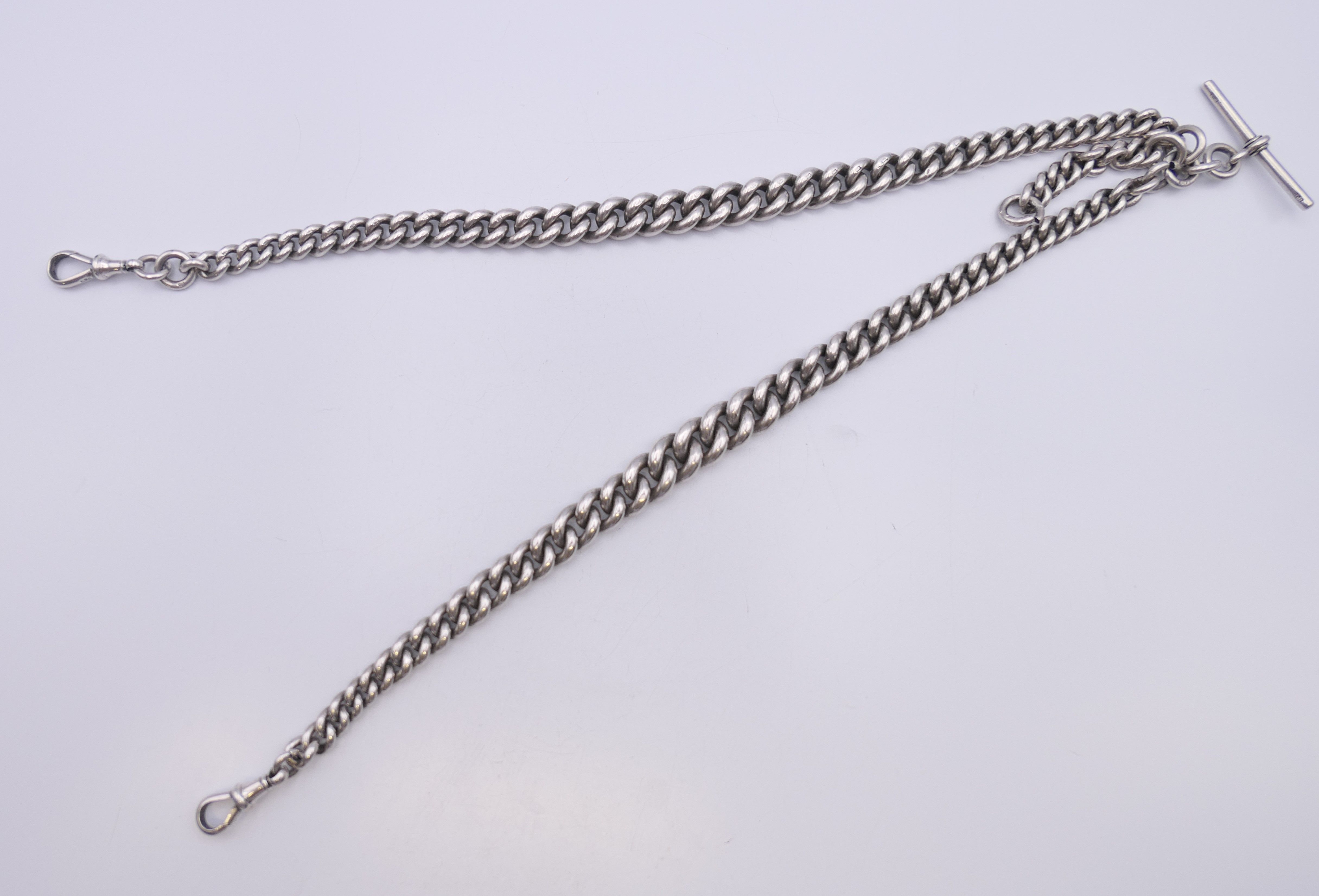 A silver watch chain. 60 cm long. 173.1 grammes. - Image 2 of 9
