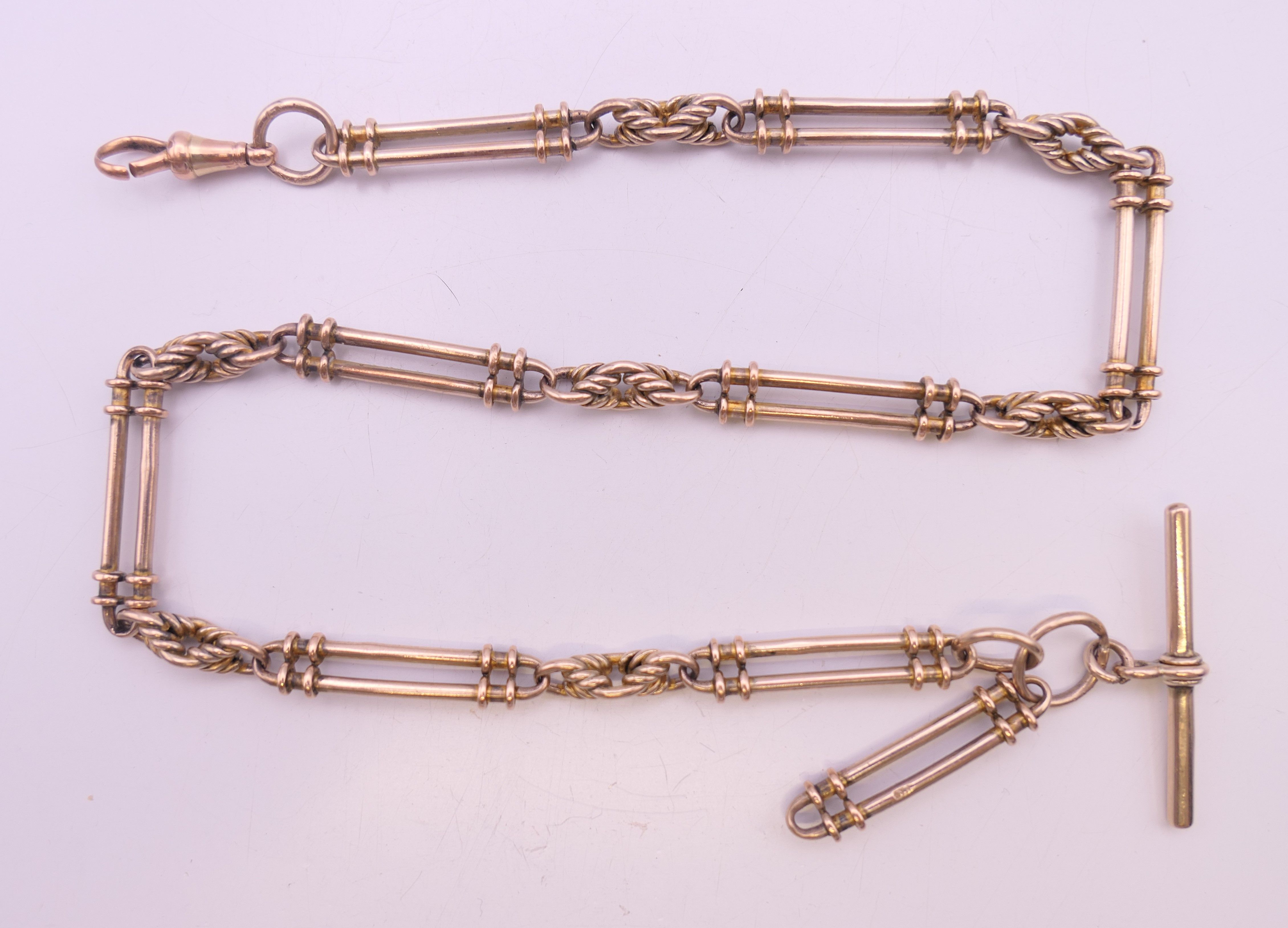 A 9 ct gold link watch chain. 41 cm long. 33.5 grammes.