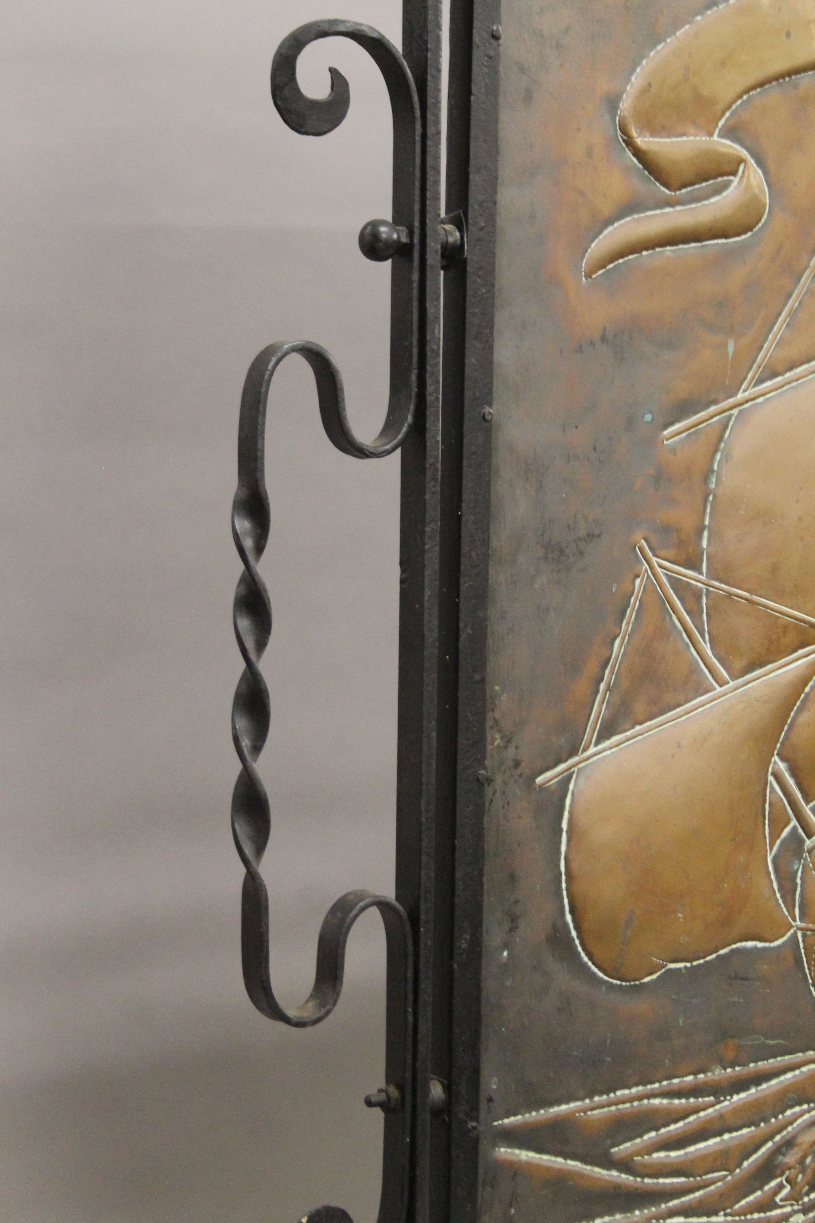 An Arts and Crafts copper and wrought iron fire screen depicting a galleon. 65 cm wide. - Image 3 of 4