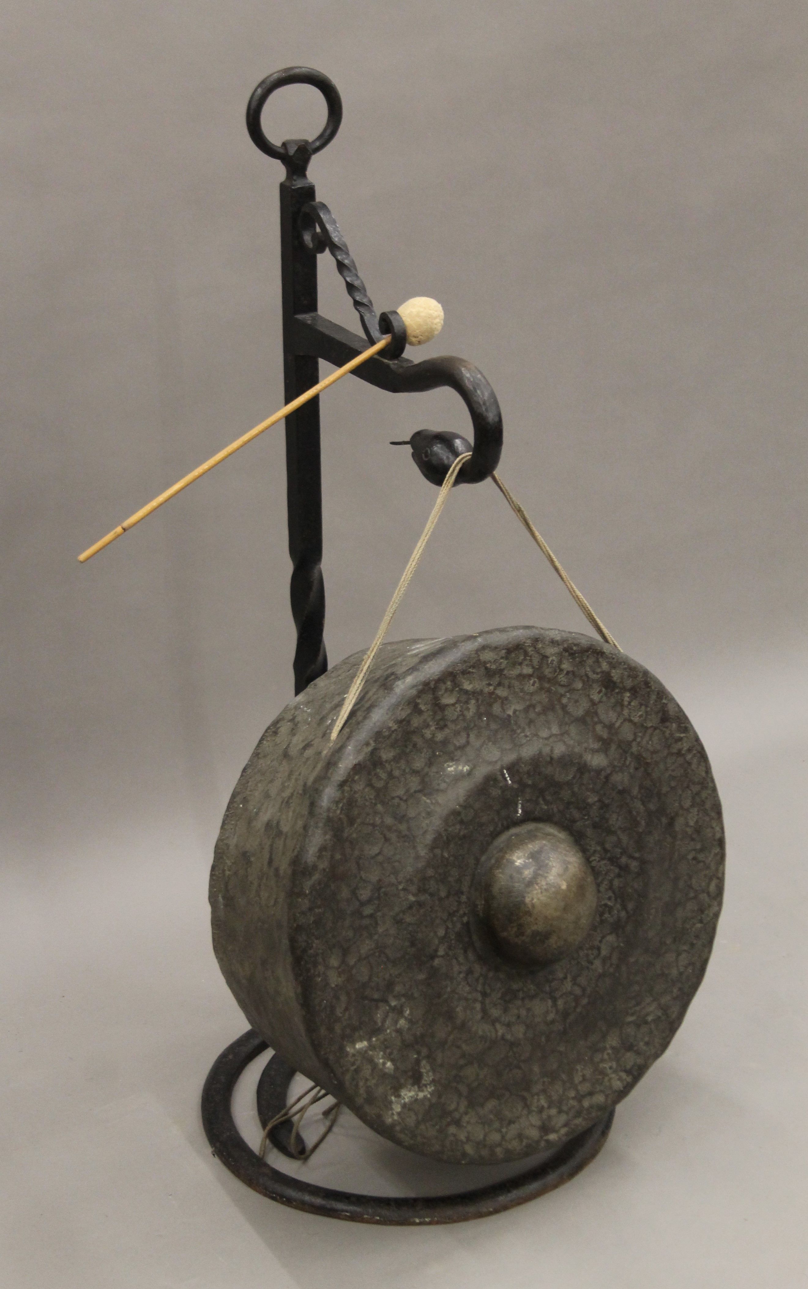 A large gong mounted on wrought iron stand formed as a snake. 98 cm high. - Image 2 of 3